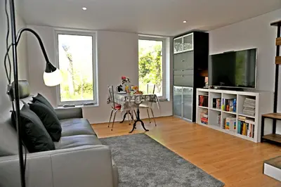 Télévision ou salle de divertissement dans l'établissement Appartement contemporain à Cognac, 50 m² - Parking.