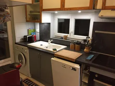 Cuisine ou kitchenette dans l'établissement Le Cèdre Bleu