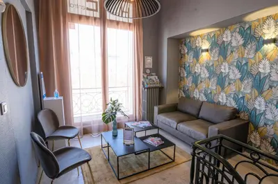 Coin salon dans l'établissement Hôtel Central