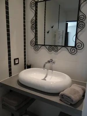 Salle de bains dans l'établissement Les Marguerites