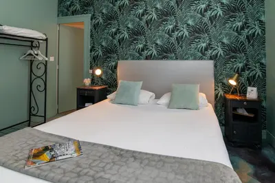 Un ou plusieurs lits dans un hébergement de l'établissement The Originals Boutique, Hôtel Victoria, Châtelaillon-Plage