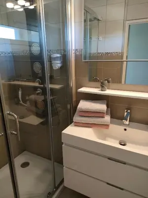 Salle de bains dans l'établissement Résidence TROUVILLE