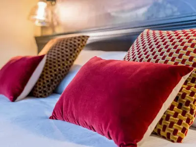 Un ou plusieurs lits dans un hébergement de l'établissement Hôtel Mercure Rochefort La Corderie Royale