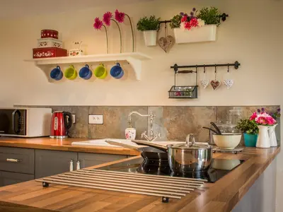Cuisine ou kitchenette dans l'établissement Chateau Le Retail