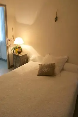 Un ou plusieurs lits dans un hébergement de l'établissement Central Hotel