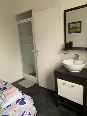 Un ou plusieurs lits dans un hébergement de l'établissement Appartement Les Acanthes 2ch Poitiers centre