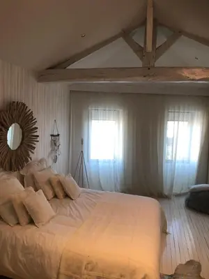 Un ou plusieurs lits dans un hébergement de l'établissement Spa campagne design