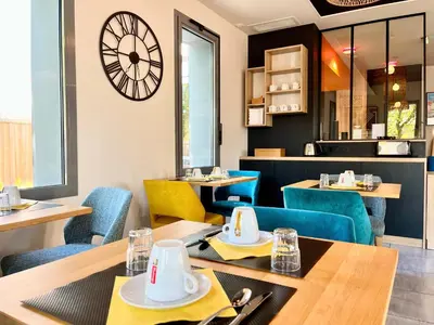 Coin salon dans l'établissement Boutique Hôtel d'Orbigny Chatelaillon - La Rochelle