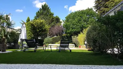 Jardin de l'établissement Chambres d'Hôtes Maison La Porte Rouge