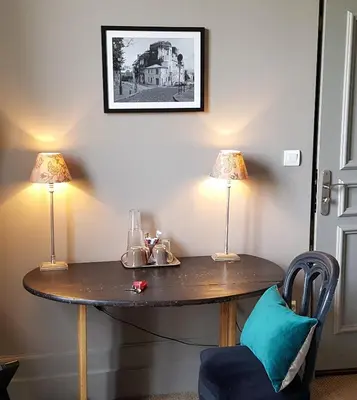 Coin salon dans l'établissement Chambres d'Hôtes Maison La Porte Rouge