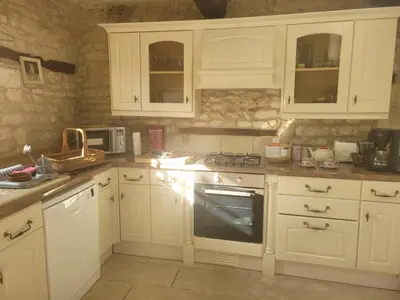 Cuisine ou kitchenette dans l'établissement La Grue Gites