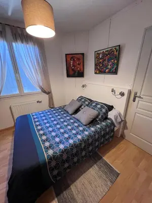 Un ou plusieurs lits dans un hébergement de l'établissement La Chambre des Amis