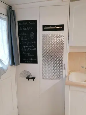 Cuisine ou kitchenette dans l'établissement Le Cottage