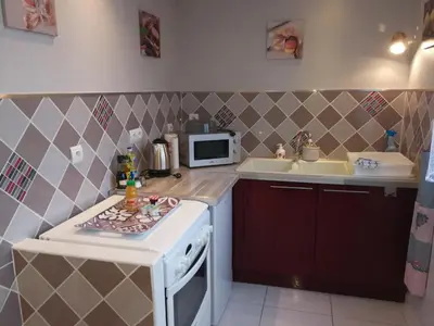 Cuisine ou kitchenette dans l'établissement Comme chez vous