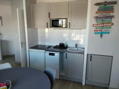 Cuisine ou kitchenette dans l'établissement Résidence MONTE CARLO