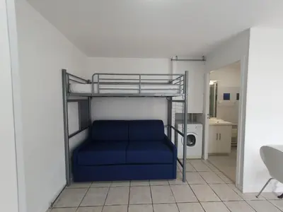 Un ou plusieurs lits dans un hébergement de l'établissement Le Cosy de Tasdon