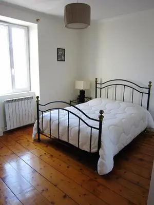 Un ou plusieurs lits dans un hébergement de l'établissement Maison de charme à La Rochelle