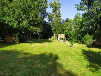 Jardin de l'établissement Gîte agréable et tout équipé La Rochelle
