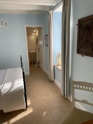 Un ou plusieurs lits dans un hébergement de l'établissement Maison Hirondelles Gîtes