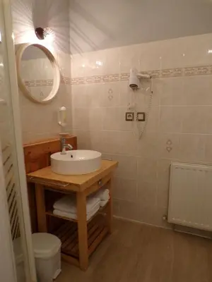 Salle de bains dans l'établissement Le Logis de la Venise Verte