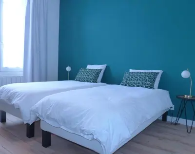 Un ou plusieurs lits dans un hébergement de l'établissement Maison En Ville