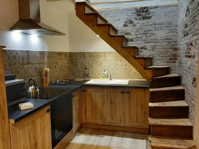 Cuisine ou kitchenette dans l'établissement Le Petit bois