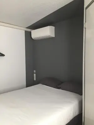 Un ou plusieurs lits dans un hébergement de l'établissement Première Classe La Rochelle Sud-Aytré