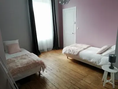 Un ou plusieurs lits dans un hébergement de l'établissement L'Angély - Chambres d'Hôtes