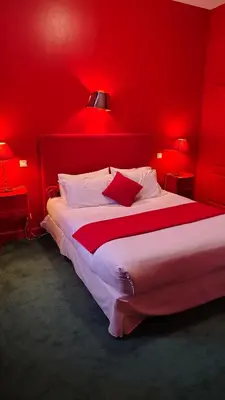 Un ou plusieurs lits dans un hébergement de l'établissement Hôtel du Palais