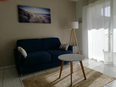 Coin salon dans l'établissement Appartement la Rochelle