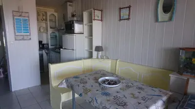 Cuisine ou kitchenette dans l'établissement les pieds dans l'eau