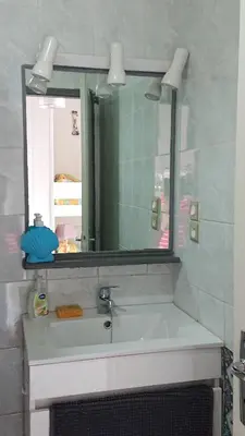 Salle de bains dans l'établissement les pieds dans l'eau