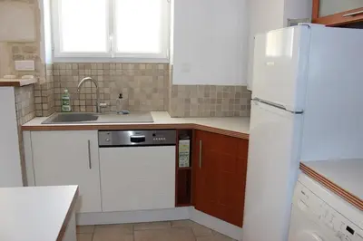 Cuisine ou kitchenette dans l'établissement La Maison d'Auguste