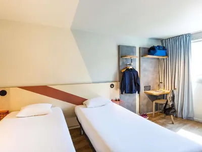 Un ou plusieurs lits dans un hébergement de l'établissement ibis budget Angoulême Centre