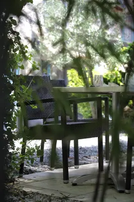 Jardin de l'établissement Logis Hostellerie de l'Abbaye