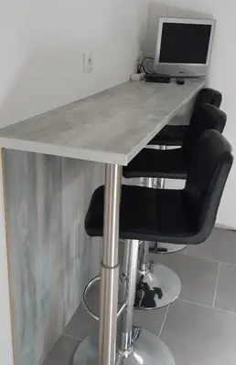 Télévision ou salle de divertissement dans l'établissement L'Abri d'Emilie - Chambre d'hôtes