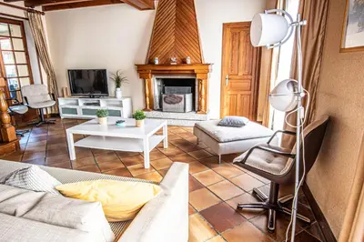 Coin salon dans l'établissement Maison familiale