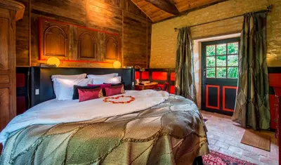 Un ou plusieurs lits dans un hébergement de l'établissement Demeures et Châteaux - Le Portail en Marais Poitevin