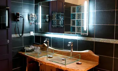 Salle de bains dans l'établissement Demeures et Châteaux - Le Portail en Marais Poitevin