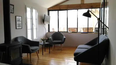 Coin salon dans l'établissement Le Gué Renard-un Balcon Sur La Charente