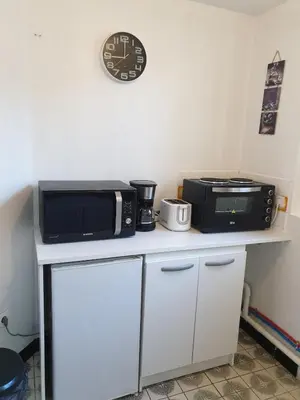 Cuisine ou kitchenette dans l'établissement Ma Location Saisonnière