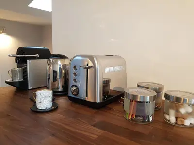 Cuisine ou kitchenette dans l'établissement La Loge du Grand Cèdre, gîte de charme