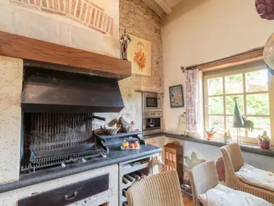 Coin salon dans l'établissement Holiday Home Moulin De Mois by Interhome