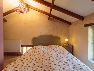 Un ou plusieurs lits dans un hébergement de l'établissement Holiday Home Moulin De Mois by Interhome