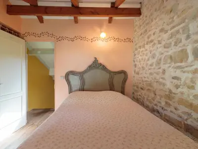 Un ou plusieurs lits dans un hébergement de l'établissement Holiday Home Moulin De Mois by Interhome