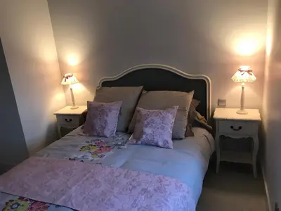 Un ou plusieurs lits dans un hébergement de l'établissement La Maison de Josephine