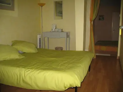 Un ou plusieurs lits dans un hébergement de l'établissement Chambres d'Hôtes Le Mûrier