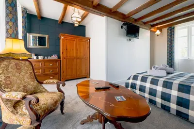 Télévision ou salle de divertissement dans l'établissement AUBERGE DU NOYER