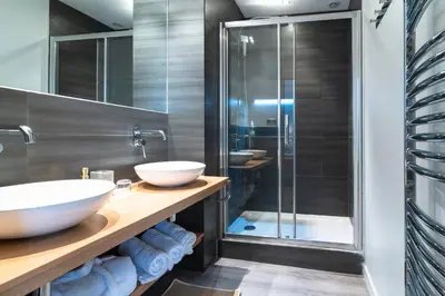 Salle de bains dans l'établissement La Maison de Marc