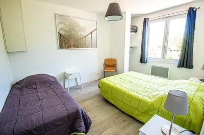 Un ou plusieurs lits dans un hébergement de l'établissement Gîte Martin pêcheur au coeur de la nature